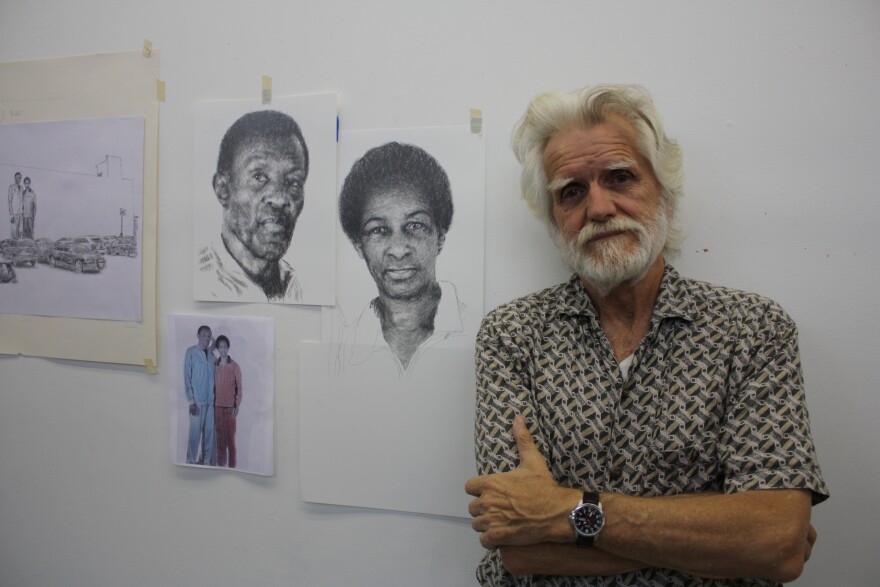 Kent Twitchell in his Downtown Los Angeles studio with plans for his Special Olympics mural.