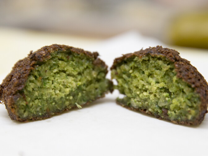 A fresh Falafel cut open at Kareem's Restaurant in Anaheim, California.