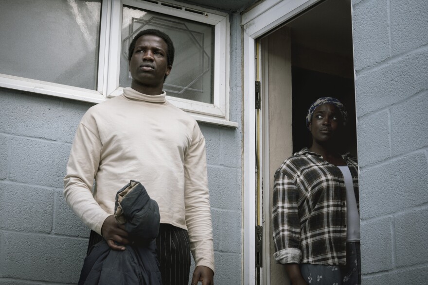 His House: Ṣọpẹ Dìrísù as Bol Majur, Wunmi Mosaku as Rial Majur. Cr. Aidan Monaghan/NETFLIX © 2020