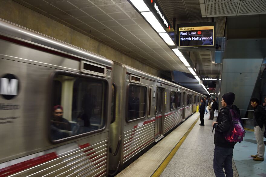 A train pulls into the station at the Universal City Metro train station on December 6, 2016 in Universal City, California.
Authorities ratcheted up security on the Los Angeles metro following a tip from overseas about an impending bomb attack Tuesday against a station in the sprawling rail network.
The threat was relayed by an anonymous man who called a public safety line run by an unidentified foreign government, which then passed on the information to a Federal Bureau of Investigation terrorism task force, said Deirdre Fike, assistant director in charge of the FBI's office in Los Angeles.
 / AFP / Robyn Beck        (Photo credit should read ROBYN BECK/AFP/Getty Images)
