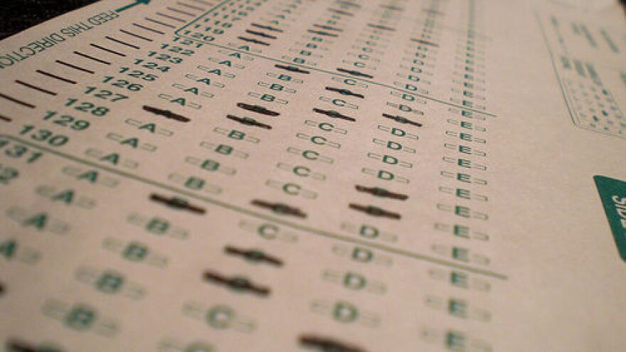 State education officials are worried about the hundreds of photos of standardized tests – sometimes with answers – that have begun to appear on social networking sites. 
