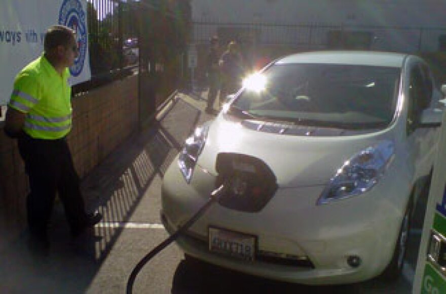 AAA worker Allan Stanley recharges a Nissan Leaf at the motor club's headquarters in Los Angeles.