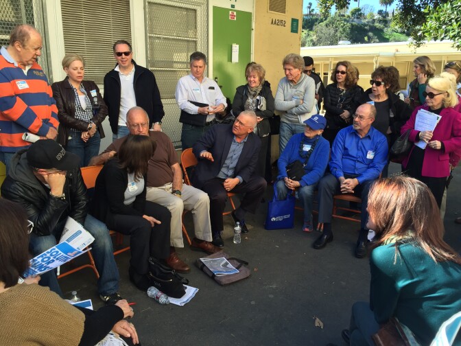 L.A. City Councilman Mike Bonin (center) meets with Brentwood residents frustrated by the increasing traffic on Sunset Boulevard near the I-405.