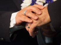 A couple gets married in West Hollywood, Calif. on July 1st, 2013.