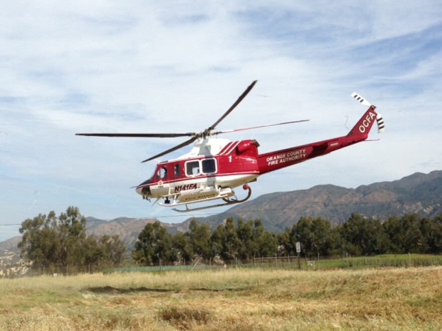 An Orange County Fire Authority helicopter takes off to assist in the search for Kyndall Jack, the 18-year-old hiker reported missing in the Cleveland National Forest.