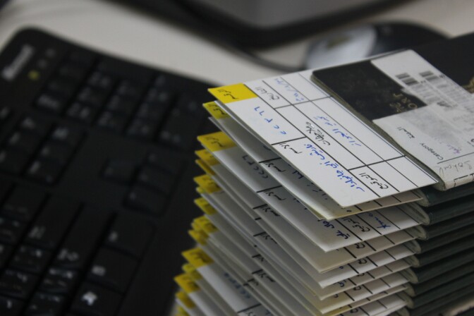 A stack of work visas await processing. A Canoga Park man who scammed businesses and immigrants looking for work visas will not serve any prison time. 