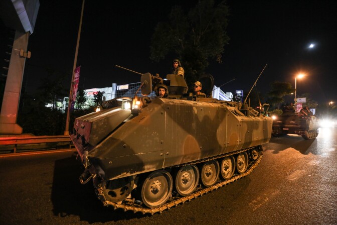 ISTANBUL, TURKEY - JULY 16: Turkish Armys APC's move in the main streets in the early morning hours of July 16, 2016 in Istanbul, Turkey. Istanbul's bridges across the Bosphorus, the strait separating the European and Asian sides of the city, have been closed to traffic. Reports have suggested that a group within Turkey's military have attempted to overthrow the government. Security forces have been called in as Turkey's Prime Minister Binali Yildirim denounced an 'illegal action' by a military 'group', with bridges closed in Istanbul and aircraft flying low over the capital of Ankara (Photo by Defne Karadeniz/Getty Images)