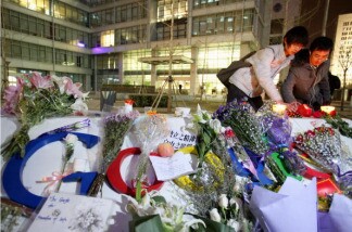 Google's fans light the candles on the Google logo at its China headquarters building on March 23, 2010 in Beijing, China.