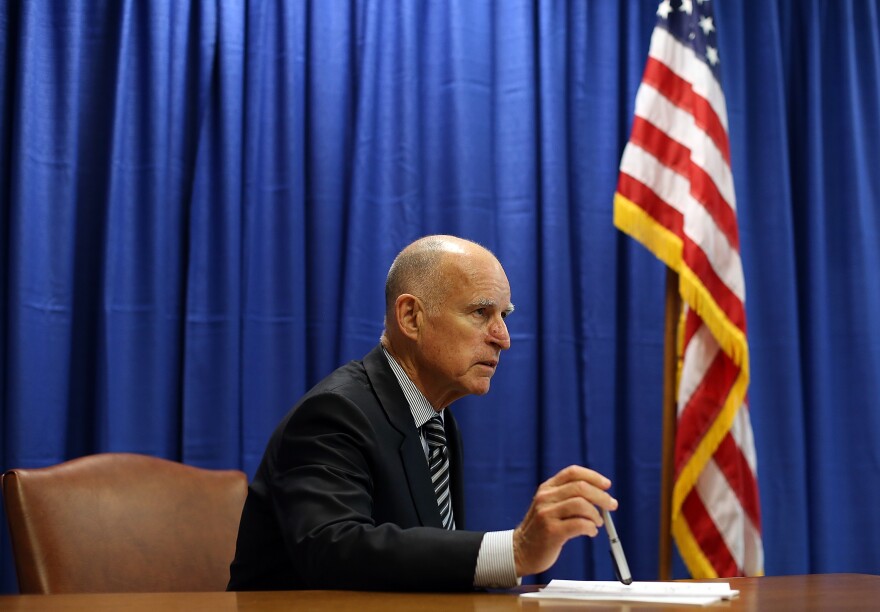 SAN FRANCISCO, CA - JULY 11:  California Governor Jerry Brown prepares to sign copies of the California Homeowner Bill of Rights (AB 278 and SB 900) on July 11, 2012 in San Francisco, California.  Gov. Jerry Brown signed the California Homeowners Bill of Rights that establishes landmark protection rules for mortgage loan borrowers. The laws go into effect on January 1, 2013.  (Photo by Justin Sullivan/Getty Images)