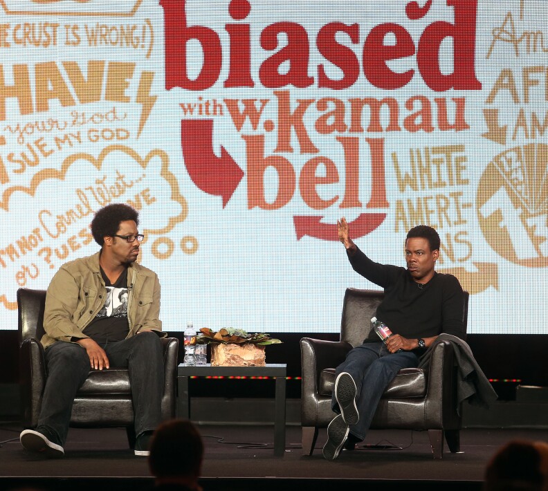 PASADENA, CA - JANUARY 09: Host W. Kamau Bell (L) and executive producer Chris Rock of the television show "Totally Biased with W. Kamau Bell" speak during the FX Networks portion of the 2013 Winter Television Critics Association Press Tour at the Langham Hotel and Spa on January 9, 2013 in Pasadena, California.  (Photo by Frederick M. Brown/Getty Images)