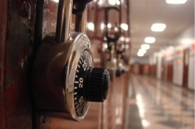A row of lockers in a high school hallway.