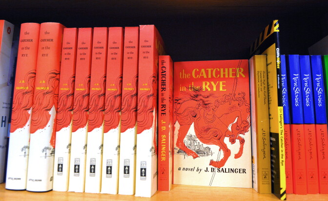 A January 28, 2010 photo shows a copies of "The Catcher in the Rye" by author J.D. Salinger at a bookstore in Washington, DC. J.D. Salinger, the reclusive author of "The Catcher in the Rye," has died at 91, his agent said January 28, raising tantalizing questions over whether the legendary writer might have left behind a hoard of unpublished works. AFP PHOTO/Mandel NGAN (Photo credit should read MANDEL NGAN/AFP via Getty Images)