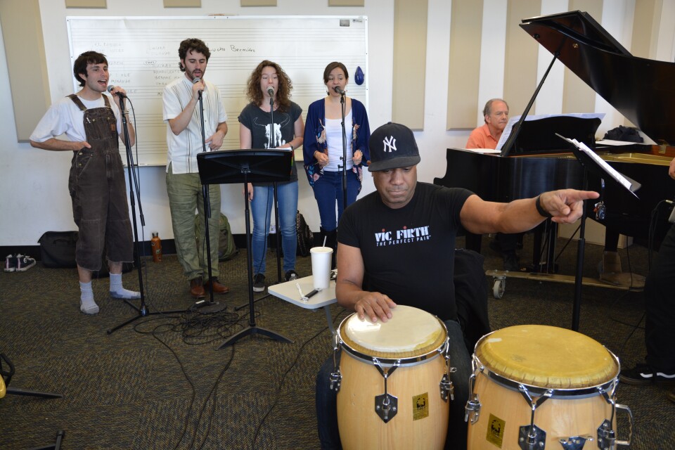 The CalArts Salsa Band singers in rehearsal. (L-R): Gabriel Stout, Pablo Leñero, Ewa Zmijewska and Tiffany Lantello. The ensemble is led by percussionist Joey de León and pianist David Roitstein.