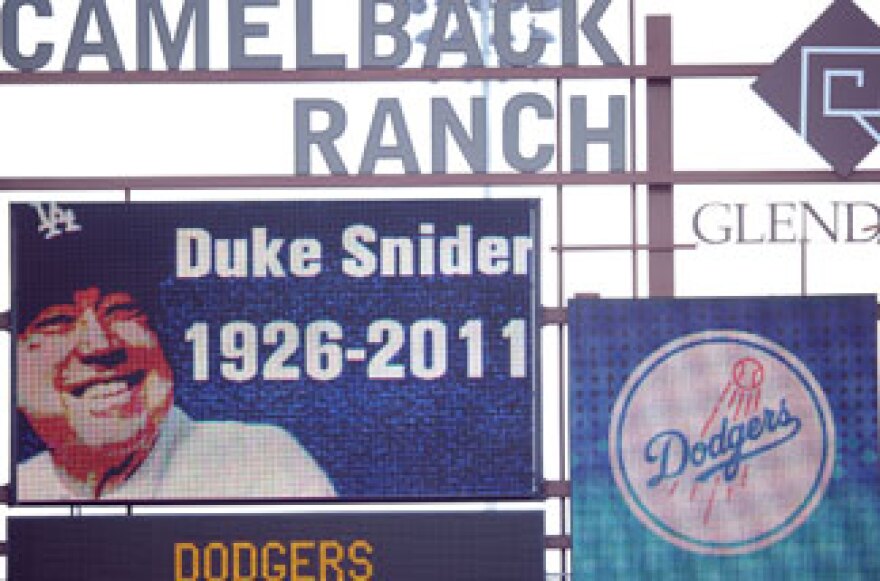 A picture of Duke Snider is displayed on the stadium scoreboard in honor of his life during the game bewteeen the Los Angeles Angels and the Los Angeles Dodgers during spring training at Camelback Ranch on February 27, 2011 in Phoenix, Arizona.