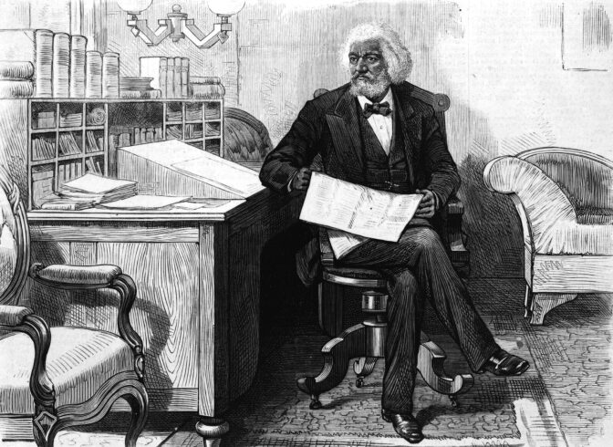 American orator, editor, author, abolitionist and former slave Frederick Douglass (1818 - 1895) edits a journal at his desk, late 1870s. (Photo by Hulton Archive/Getty Images)