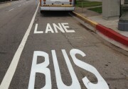 Dedicated bus-only lanes have been painted on Wilshire Boulevard, like this sign at South Park View Street.