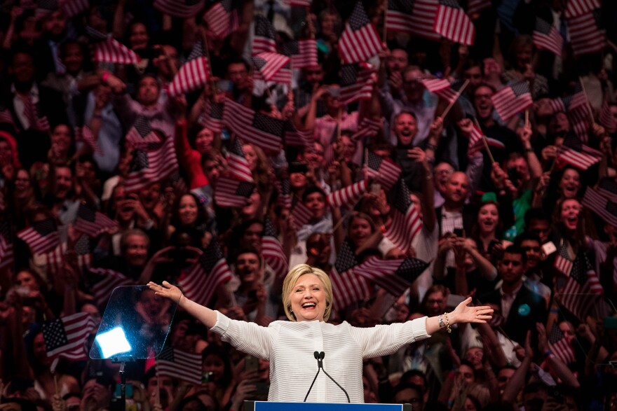 NEW YORK, NY - JUNE 7: Democratic presidential candidate Hillary Clinton arrives onstage during a primary night rally at the Duggal Greenhouse in the Brooklyn Navy Yard, June 7, 2016 in the Brooklyn borough of New York City. Clinton  has secured enough delegates and commitments from superdelegates to become the Democratic Party's presumptive presidential nominee. She will become the first woman in U.S. history to secure the presidential nomination of one of the country's two major political parties. (Photo by Drew Angerer/Getty Images)