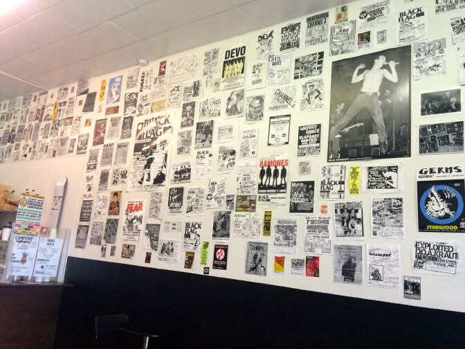 Flyers for old punk shows cover the walls in Rad Coffee.