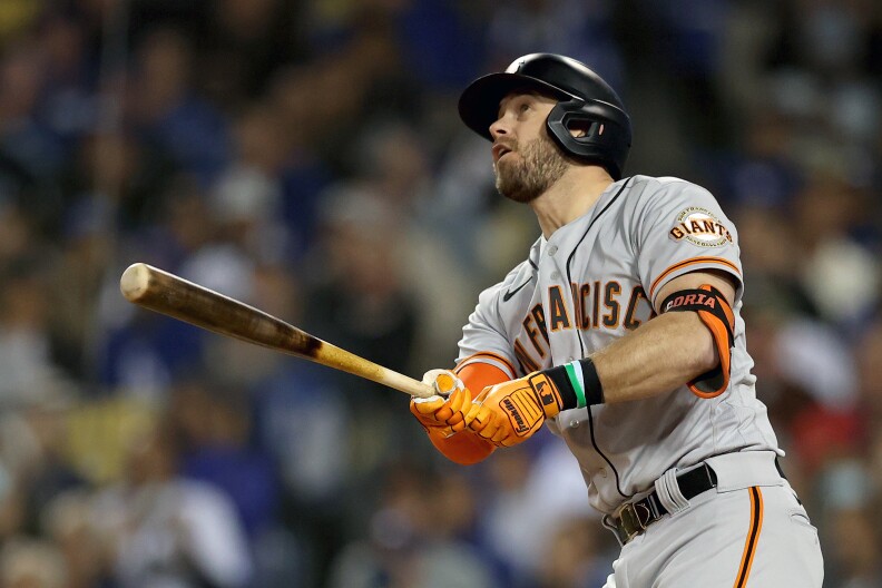 Evan Longoria watches the ball after connecting with his bat.