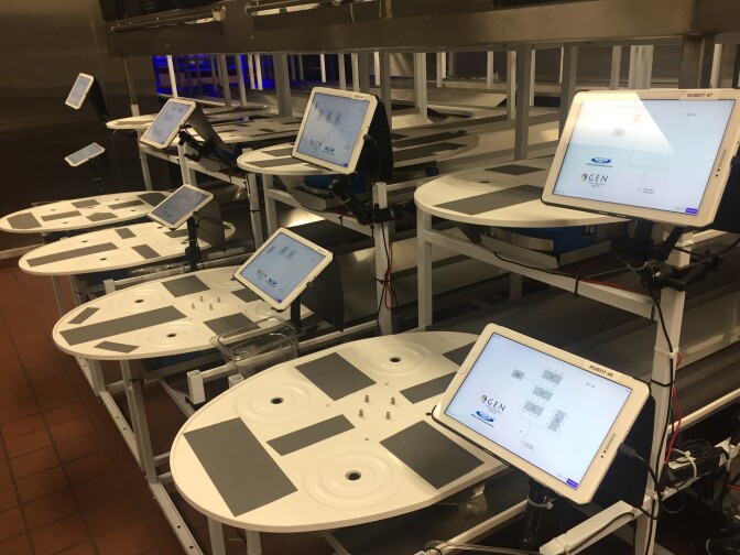 Dock station for all eight robots at the Montclair Gen Korean BBQ