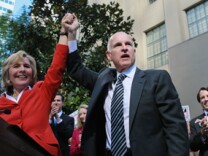 California Attorney General and democratic gubernatorial candidate Jerry Brown (R) and U.S. Sen. Barbara Boxer (D-CA) raise their arms during a campaign rally at the Los Angeles public library on November 1, 2010 in Los Angeles, California. With one day to go until election day, Jerry Brown is wrapping up his three day campaign trip throughout California in hopes of defeating his republican challenger and former eBay CEO Meg Whitman.
