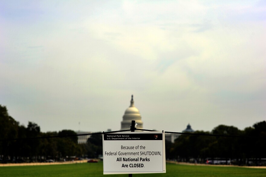 A closure sign is posted on the national mall near the US Capitol in Washington, DC, October 3, 2013, as seen during the third day of the federal government shutdown. US President Barack Obama on October 3, directly attacked Republican Speaker John Boehner, saying he could end a 'reckless' US government shutdown in just five minutes. 