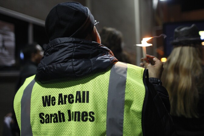 LOS ANGELES, CA - MARCH 7:  People gather at the International Cinematographers Guild national offices during a candlelight walk and memorial for Sarah Jones, an assistant camerawoman who was killed by a train while shooting the Gregg Allman biopic film, Midnight Rider, on March 7, 2014 in Los Angeles, California. The remembrance of the 27-year-old camerawoman is organized by members of the International Cinematographers Guild and the production community who want to highlight the importance of safety over a production's schedule or budget. The accident which occurred February 20 on a train trestle over the Altamaha River in Georgia and injured seven other crew members. Production on the film starring William Hurt and directed by Randall Miller has been suspended since the February 20 tragedy.  (Photo by David McNew/Getty Images)