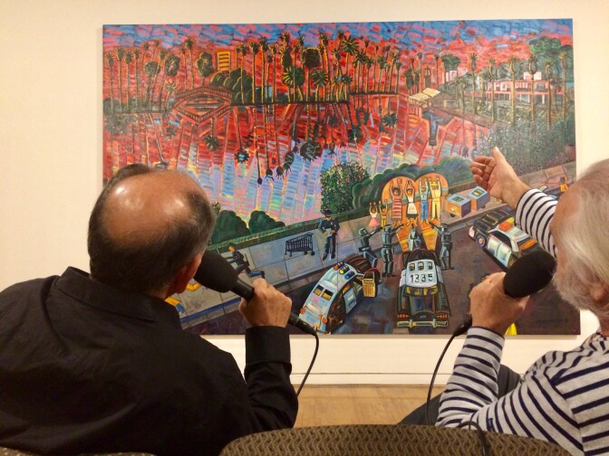 (L-R) Cheech Marin and Frank Romero tape a conversation for The Frame in the galleries of the Museum of Latin American Art in Long Beach where Romero is getting his first major retrospective.
