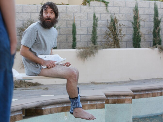 Phil (Will Forte) uses his toilet pool as Carol shows up on Fox's "The Last Man On Earth."