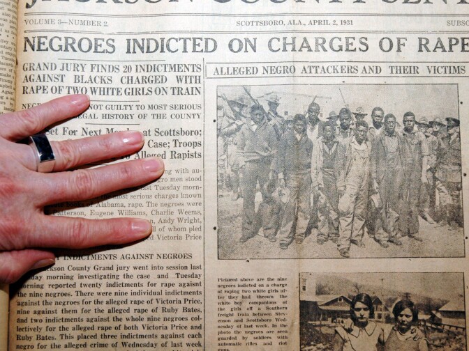 This Feb. 10, 2010 photo taken in Scottsboro, Ala., shows the Jackson County (Ala.) Sentinel from April 2, 1931, when nine young black men called ``The Scottsboro Boys'' were arrested on charges of raping two white women. The charges were later revealed as a sham, and the case gained notice worldwide. A new museum documenting the case has opened in Scottsboro. Only one of the nine Scottsboro Boys was formally pardoned by Alabama before dying. State officials would like to clear the names of the other eight, but figuring out how to rewrite history after 81 years is proving difficult.  