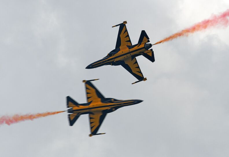 The Republic of Korea Air Force (ROKAF) Black Eagles aerobatic team performs during a media preview for the Singapore Airshow on February 4, 2018.