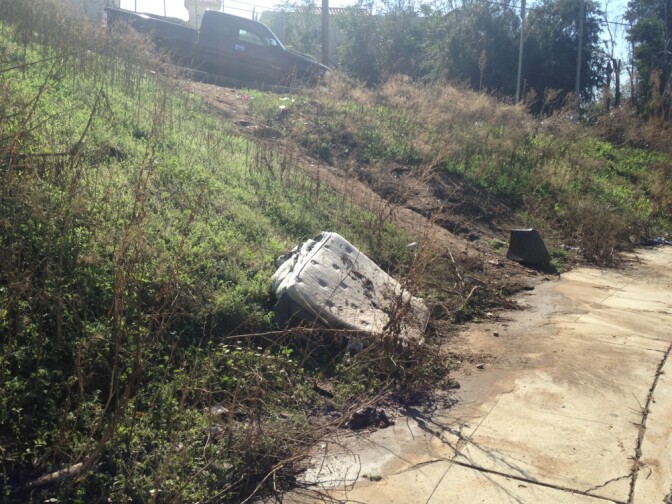 A dumped mattress along Bernal Avenue in Boyle Heights. Residents complain that people dump debris in the neighborhood, but that when they report it to the city, response is slow.