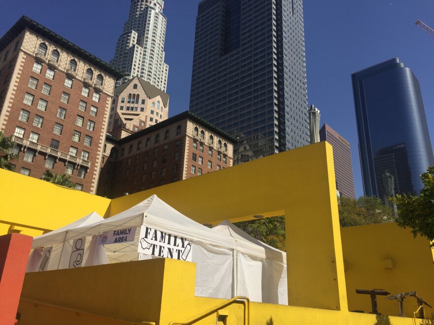 The family tent at the March for Science in L.A. was tucked in a corner by a playground and away from the loud main stage in Pershing Square.