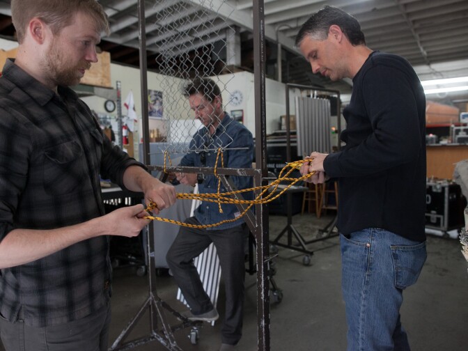 Composer Andrew Norman, left, meets with L.A. Chamber Orchestra percussionists Wade Culbreath, right, and Ted Atkatz to work on instrumentation for Norman's piece, "Frank's House,"  which is inspired by Frank Gehry's residence. 