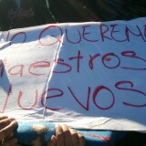 Miramonte students and parents protest a complete change in faculty and staff at the elementary school. The protest sign reads: "We don't want new teachers"