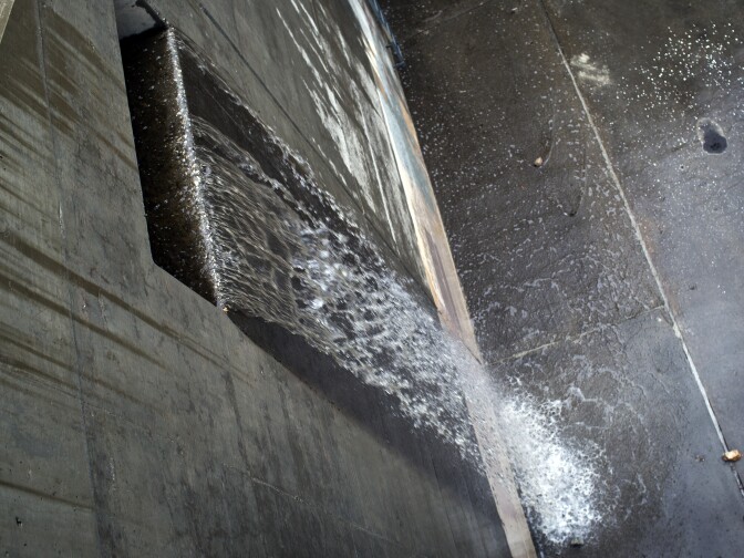 Water flows at Devil's Gate Dam in Pasadena on Tuesday morning, Sept. 15, 2015. Rainfall reached record levels in areas of Los Angeles.