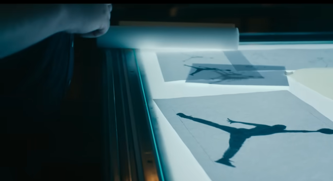 a scene from the Air movie of developing the logo of Nike's Jordan shoes