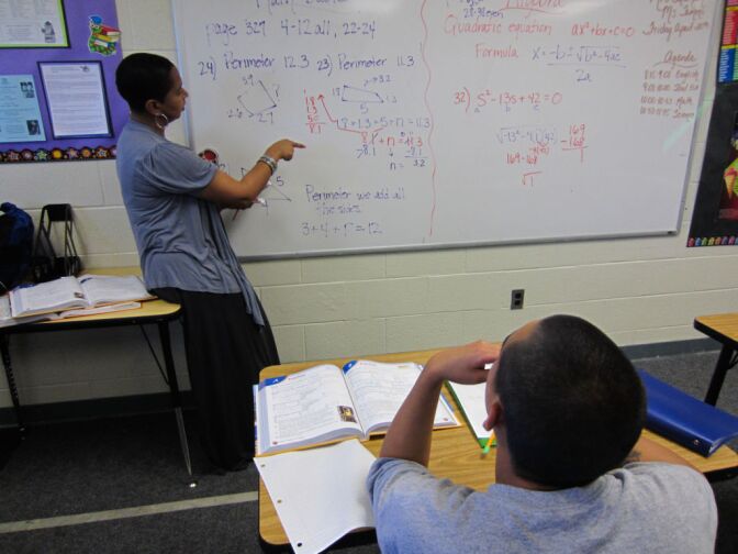 A student at Christa McAuliffe High School in Challenger probation camp listens to a teacher lecture about math. “The kids are beginning to see that somebody really cares about their environment, and they’re taking better care of it themselves,” said L.A. County Office of Education Superintendent Arturo Delgado. 