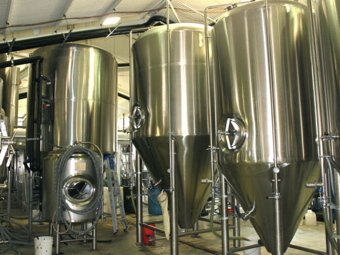 These conical vessels at Golden Road Brewing make up the brewing process, from mashing to lautering to brewing to fermenting. Golden Road produced roughly 7500 barrels of beer last year in these vessels, but they will be phased out as the brewery installs a bigger system.