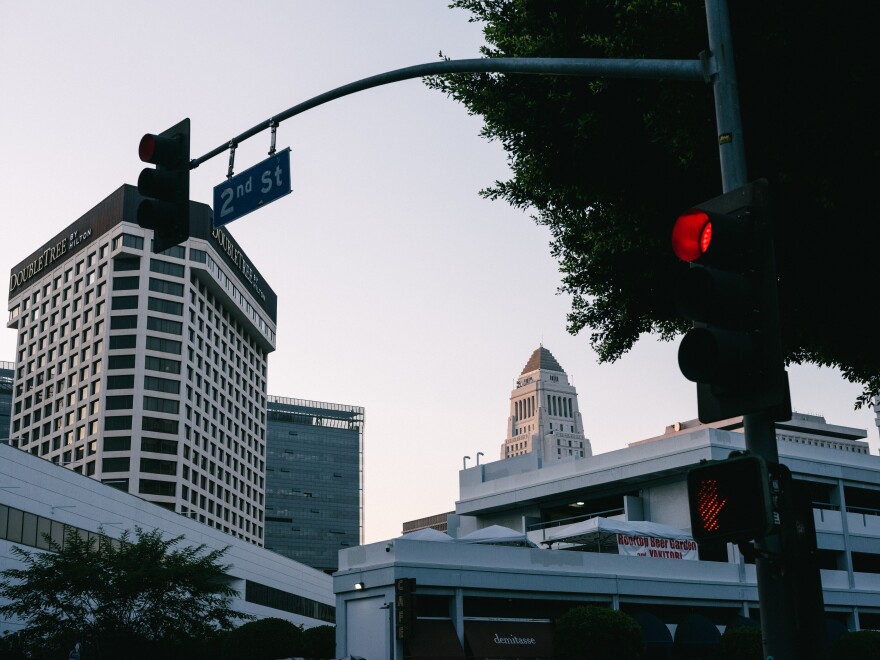Buildings, including City Hall, near a cross street in Little Tokyo.