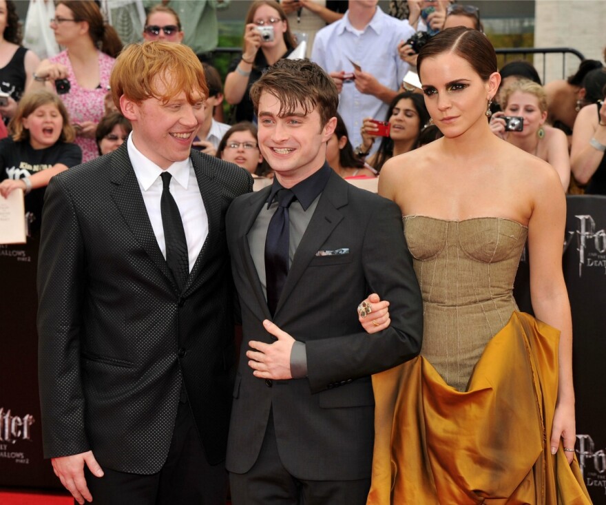 Rupert Grint, Daniel Radcliffe and Emma Watson attend the New York premiere of Harry Potter And The Deathly Hallows: Part 2.