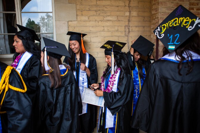 Undocumented students at UCLA line up for graduation on June 15, 2012, the same day that the White House announced that deportations would be deferred for many undocumented youth.