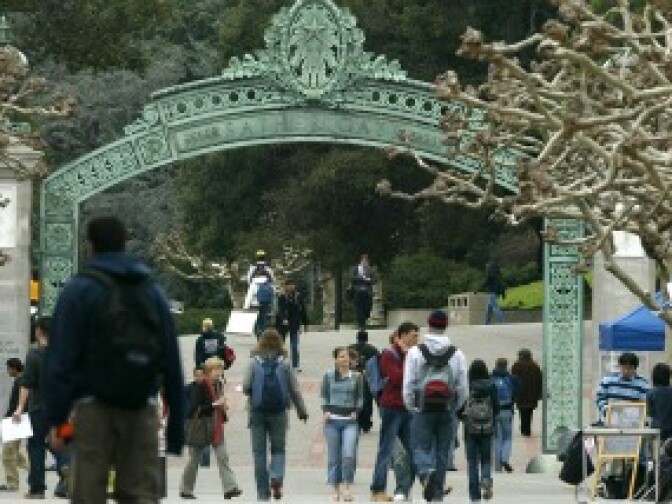 Students walk near Sather Gate on the University of California at Berkeley campus.