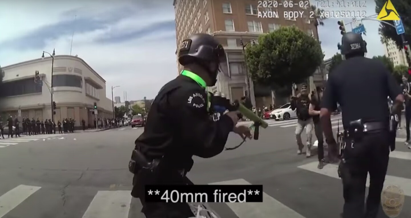 Still from LAPD body camera footage, showing officer shooting Benjamin Montemayor with a projectile.