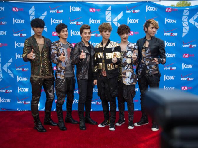 Members of the K-Pop supergroup Exo pose for photographs at KCON on Sunday. The group is split into two parts, one focused on the Korean market and one focused on the Chinese market.