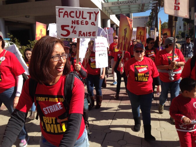 File: Cal State faculty supporters march in Long Beach in November 2015 to support a 5 percent salary increase.