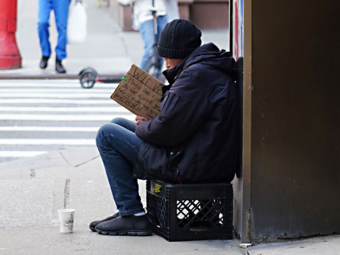 NEW YORK, NEW YORK - APRIL 12:  A homeless person is seen during the coronavirus pandemic on April 12, 2020 in New York City. COVID-19 has spread to most countries around the world, claiming over 110,000 lives with infections at over 1.8 million people.  (Photo by Cindy Ord/Getty Images)