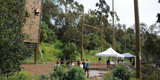 People perform wall climbing and rope-related activities at Culver City Park. 