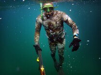 Dr. Joe Farlo spearfishes near Redondo Beach on Wednesday, Aug. 14. The sport of spearfishing started in San Diego during World War II.
