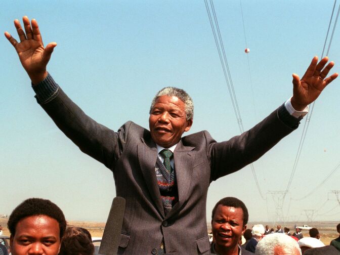 South African National Congress President Nelson Mandela addresses in Tokoza a crowd of residents from the Phola park squatter camp during his tour of townships Sept. 5, 1990.